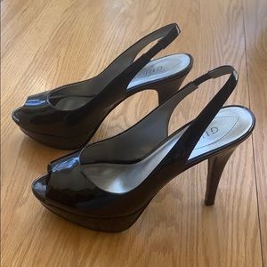 Black patent leather, sling back heels